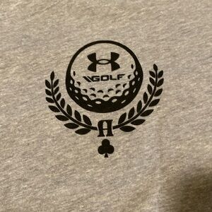 Men’s UnderArmour Large loose fit gray Golf tee shirt. NWOT. Never worn.